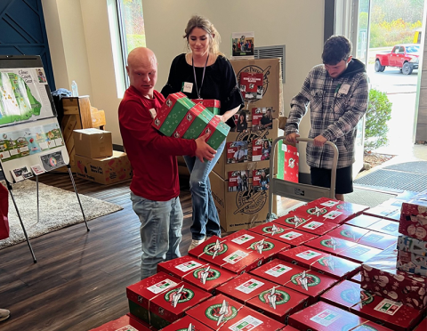 Samaritans Purse is having its annual shoebox drive for Operation Christmas Child November 17 through 24. Shoeboxes can be dropped off at The Ridge Community Church in Mineral Bluff during those dates. Riley Manders, Stephen Harris and Katie Jerauld are busy organizing shoeboxes.