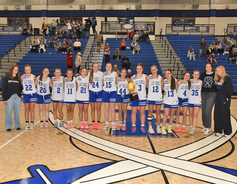 The Fannin County Middle School eighth grade girls basketball team won the Mountain League Championship December 17 by defeating Lumpkin County. Pictured are team members, from left, Coach Natasha Anderson, Alex Evans, Emilie Hamilton, Emma Kay, Annie Dockery, Khloe Kay, Hadlee Patterson, Bristol Hawkins, Oakley Baker, Gracie Gray, Elizabeth Evans, Bailee Rhodes, Ryann King, Sophie Price, Coach Emily Stone, and Coach Kristin Kay.
