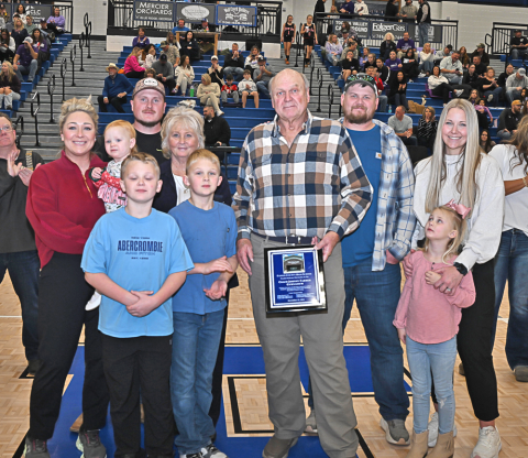 The Fannin County High School gymnasium has been named the Coach Johnny Farmer Gymnasium. Farmer, who coached for over 30 years in the Fannin County School System, was honored at a dedication ceremony December 13. Members of Farmer’s family were on hand and honored also. Farmer, holding a plaque, is shown with family members Brianna Farmer, Navy Farmer, Neyland Farmer, Jordan Farmer, Donna Farmer, Deacon Farmer, Coach Farmer, Jonathan Farmer, Deana Farmer and Lindsey Farmer. 