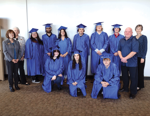 NGTC Blairsville Campus held a High School Equivalency Recognition Ceremony November 4 where students from Fannin and East Polk receive their GED certificates. Pictured are, from left, front, Moose Roberson, Kailee McCue, Colten Reed; back, Flag Director Teresa Ross, Dean of Adult Education Shelby Ward, Madison Roach, Tyler Johnson, Joan Mulcare, Joshua Runions, Lucas Jarrett, Brady Payne, Adult Education Instructor Patrick Smith and FLAG Board of Directors chairperson Jane Brackett.