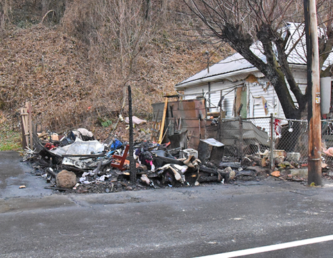 Described as an “attached structure” in dispatch records, it was totally destroyed in an early morning fire that left Gina Golden severely burned.