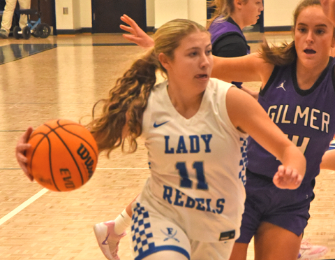 Izzie Jabaley drives for two points.