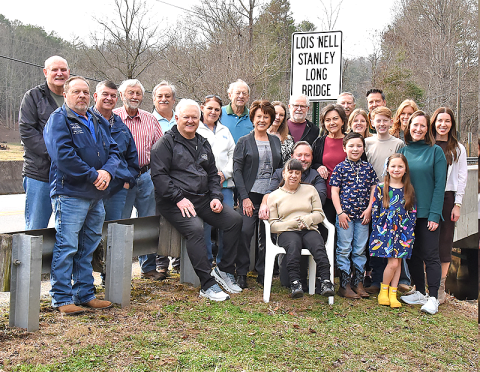 Fannin officials and members of the Lois Nell Stanley Long family gathered to dedicate the bridge over Big Creek on Aska Rd. Shown are Post 2 Commissioner Glenn Patterson, Public Works Director Zack Ratcliff, Commission Chairman Jamie Hensley, Merle and Freddy Long, Post 1 Commissioner Johnny Scearce, Robbie Long, Gerald Long,  Gina Golden, Heather Long, Shane Rogers, Rocco Rogers, Marley Rogers, Annette Long, Lyle and Cathy Scruggs, Ray, Jordan, Josh, Brody, and Erin Golden, Aly Ethington, Allison Rodgers.