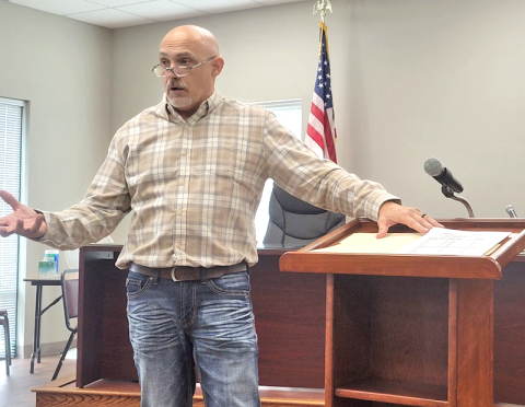 Cline Bowers describes his water plant’s operation to members of the Fannin County Water Authority last week. Fannin commissioners were at the meeting.