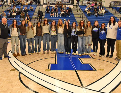 Members of the 2021 Lady Rebels basketball team recognized last Tuesday night were, from left, Coach Randy Hallmark, Reigan O’Neal, Becca Ledford, Mackenzie Johnson-Postell, Prisila Bautista, Olivia Sisson-Rhodes, Natalie Thomas, Ava Queen, Paige Foresman, Courtney Davis, Reagan York, Riley Reeves, Abby Ledford, Jenna Young, Coach Megan Orton and Head Coach Ryan Chastain. 