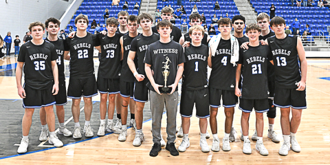 The Fannin County Rebels display the Runner Ups trophy they came home with from the Region Tournament Saturday night at Armuchee High School in Rome - Photo courtesy of All Star Photos