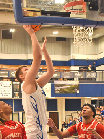 News Observer Photo/Glenn Harbison Keaton Watkins zeros in on two points in the Fannin County Sweet 16 win over the Thomasville Bulldogs.