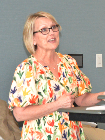 News Observer photos/Enola Patterson: Sheree Ralston, left, and Spiro Amburn told of David Ralston’s love of reading and dedication to the library