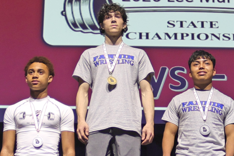 Fannin County High School 140-pound class weightlifter Troy Partain, center, took home the 2026 state championship at the Lee Murray State Weightlifting Championships March 7. Lupe Jose Valasquez, right, finished runner up in the state.