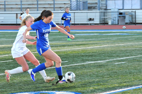  Fannin County Lady Rebel Avi Ethington (#19) controls the ball and her Pickens opponent March 12.
