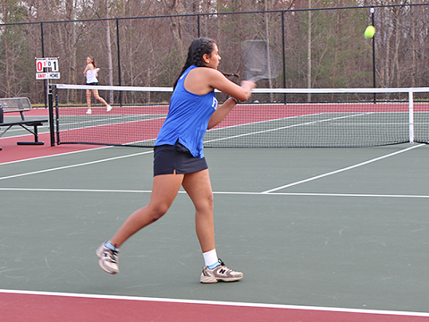 Fannin County High School’s  number three singles player Krishvee Panchel returns the ball in recent action.