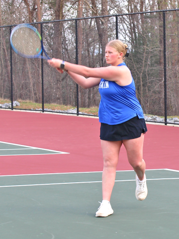 Fannin County High School girls tennis team member Kendall Clore competes in girls doubles and is seen hitting her shot from the back of the court at the school’s match March 4.  