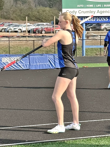 Adia Galloway prepares for a pole vault attempt at the Model Six Land Spectacular where she finished second.