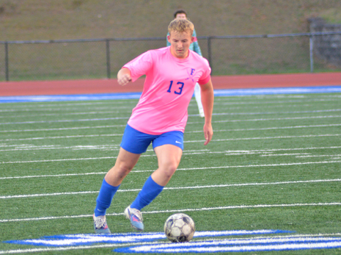 Fannin High School Rebel Gage Flowers drives the ball down the open field to gain the advantage in recent action at home.