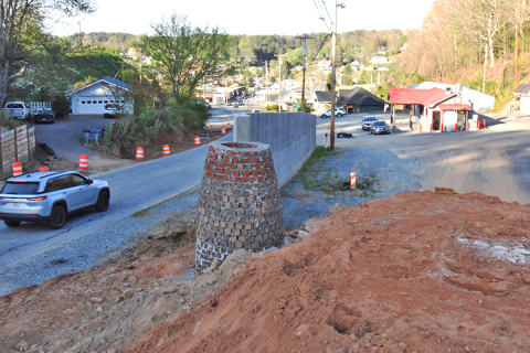 Construction was on hold for the evening last Friday, April 10, on the Blue Ridge Drive roundabout in McCaysville. This photo was taken from the highest point of where dirt has been placed so far, looking north toward Blue Ridge Drive toward the downtown area. Papa’s Pizza is seen on the right.