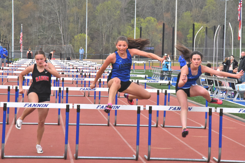 Saige Turner (center) and Mckinley Lord (right) out ran their Rabun County opponent in action at home March 30.
