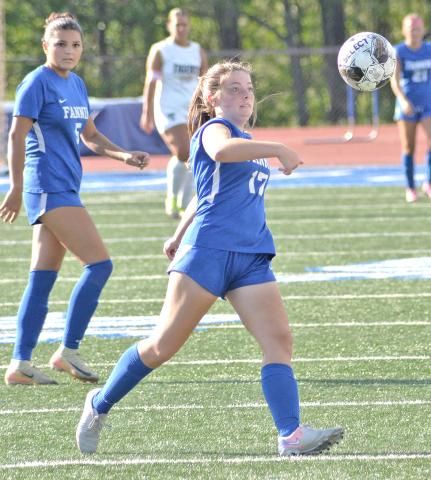 Fannin Lady Rebel Lily Williams (17) goes for the kick while Natalie Middleton (5) looks on. 