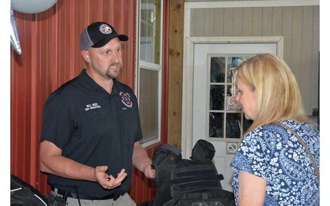 News Observer photo/Mollie Morrow - Will Reed with the Fannin County Emergency Management Agency speaks of some needs during Impact100 Fannin's Non-Profit Fair and Big Reveal June 9.