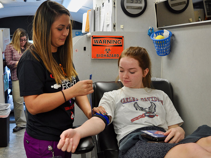 Donor Care Specialist Kristin Forrest preps Fannin County High School student Kimberly Wyant to give blood during Blood Assurance’s blood drive on the high school campus Friday, September 20.