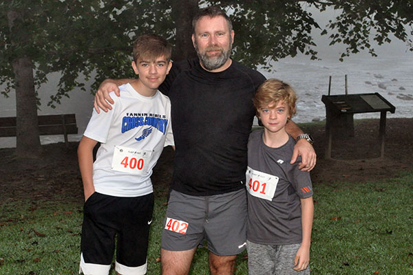 The Boys & Girls Club of North Georgia hosted a Labor Day 5K River Run at Horseshoe Bend Park Saturday, August 31. Runners are pictured from left, James Bewley, J.P. Bewley and Johnathan Bewley.