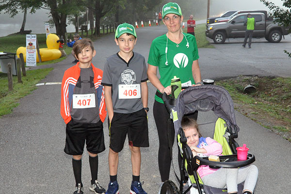 The Boys & Girls Club of North Georgia hosted a Labor Day 5K River Run at Horseshoe Bend Park Saturday, August 31. Runners had almost perfect conditions for running. Pictured are, from left, Lucas Gardo, Jack Gardo, Dora Bryson and Drew Bryson.