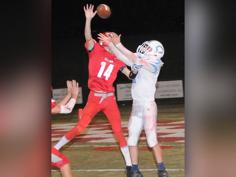 Copper Basin Cougar Logan Burkett (14) blocked this long pass against the McMinn Central Chargers.