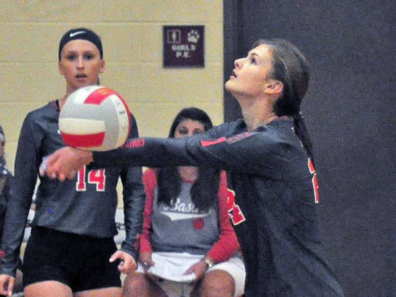 Lady Cougar Albani Dotson keeps a volley alive in recent action for the Copper Basin.