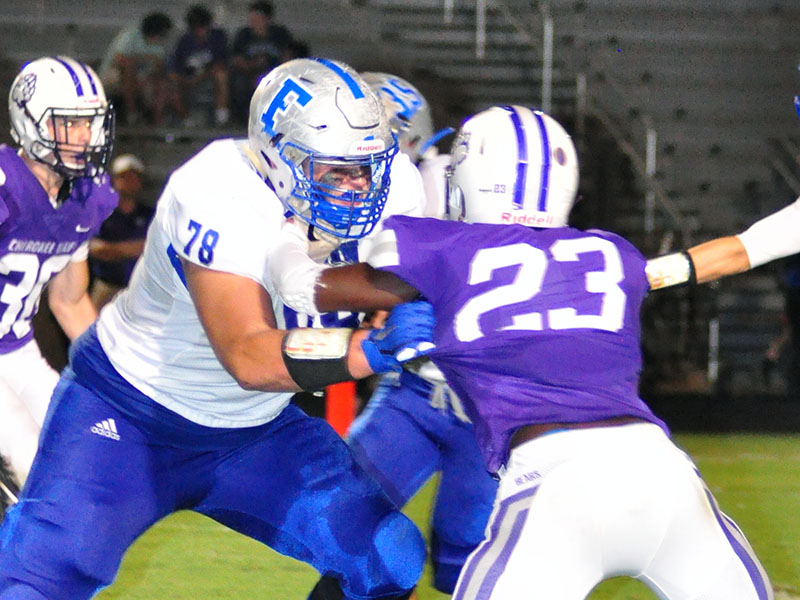Rebel lineman Miles Johnson (78) blocks a Cherokee Bluff defender during Fannin County’s region football game with the Bears Friday, October 4.