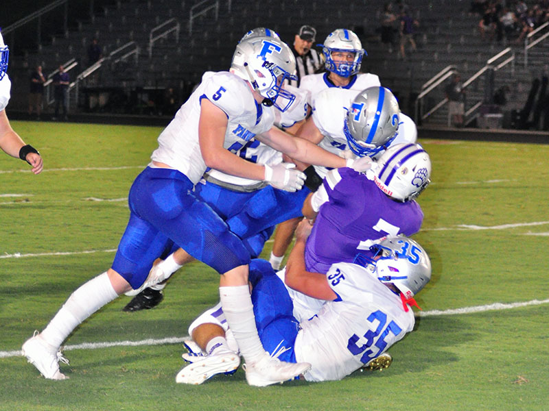 The Fannin defense had a great outing against the Bears Friday, October 4. The Rebels gave up only seven points through four quarters. Rebels Seth Reece (5), Carson Beavers (2) and Will Mosely (35) gang tackle a Cherokee Bluff ball carrier during the Rebels region win against the Bears Friday, October 4.
