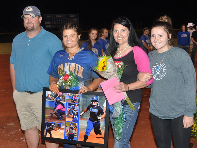 Eryn Mealer was one of five senior Lady Rebels to be recognized after the Lady Rebels game with Lumpkin County Thursday, September 26. Shown are, from left, Matthew Mealer, father; Mealer; Samantha Dutton, mother; and Emily Mealer, sister.