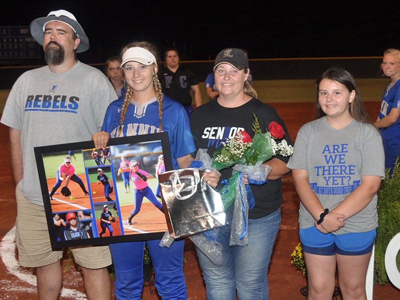 Kayleigh Russell was honored after the Lady Rebels softball game against Lumpkin County Thursday, September 26. Shown are, from left, Justin Russell, father; Russell; Tina Russell, mother; and Kelsey Russell, sister.