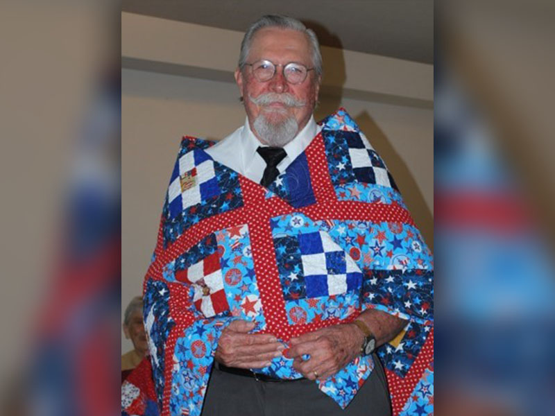 James Joldersma, from Mineral Bluff, served in the U.S. Air Force from 1966 to 1970 in the Vietnam War. Joldersma was awarded the National Defense Service Medal, the Good Conduct medal and a Marksman ribbon. He is shown with the Quilt of Valor he received from the Misty Mountain Quilters October 13.
