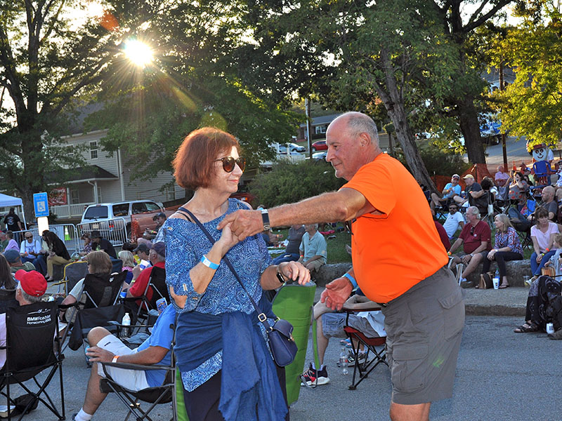 Eleanor and Mike Bliss dance the evening away to blues tunes at the Blue Ridge Blues & BBQ Festival in downtown Blue Ridge, Saturday September 21.