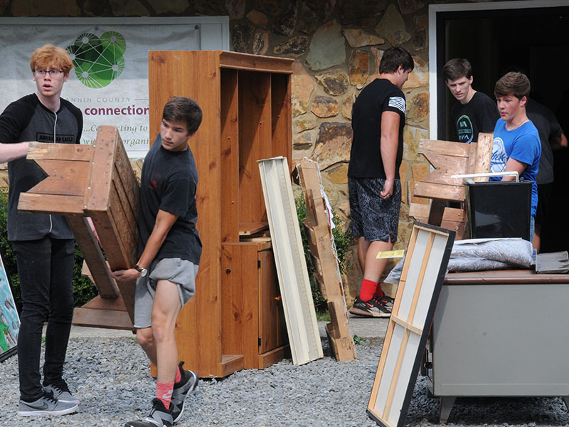 Fannin County High School football players and wrestlers helped move Family Connection to their new facility at the end of Industrial Park Road, September 27. Shown doing the heavy lifting are, from left, James Kinser, Grayson Patterson, Chris Scott, Austin Dobson and Colby Shaw.