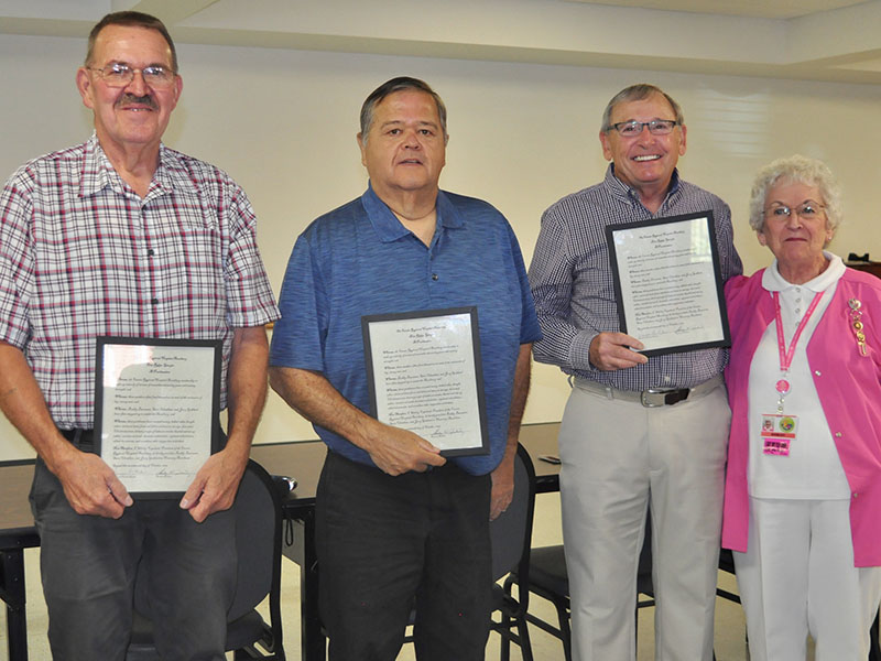 The Fannin Regional Hospital Auxiliary honored three of the “big, strong men” who help them with a variety of tasks as “honorary auxilians” Thursday, October 17. Shown are, from left, Jerry Goddard, Buddy Baumann, Steve Cheatham and President Shirley Copeland.