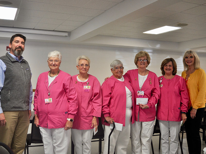 Members of the Fannin Regional Hospital Auxiliary received service hour pins during their quarterly meeting Thursday, October 17. Shown are, from left, Fannin Regional Interim CEO Jason Jones, Carol Thomas, Vicky Goddard, Lena Hill, Becky Guthrie, Cheryl Drake and Fannin Regional Director of Volunteer Services Susan Kiker.