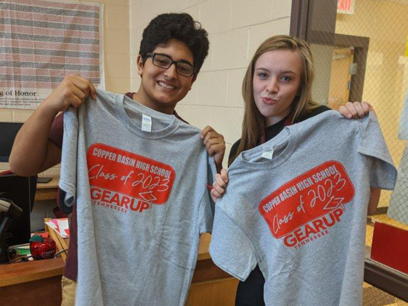 Copper Basin High School students Krus Soto, left, and Isabella Brown display their Class of 2023 Commitment to Graduate t-shirts following the Commitment to Graduate banner signing ceremony.