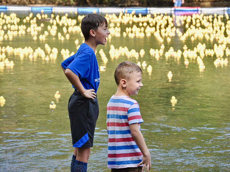 Ryder Jones, left, and River Rayborn watched as a sea of rubber ducks raced to the finish line at the Boys & Girls Clubs of North Georgia’s annual Great 515 Duck Derby Saturday, September 28.