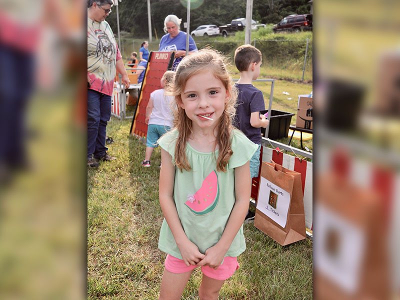 Bristol Erwin enjoyed her prize lollipop at Fannin County elementary schools’ Fall Festival.