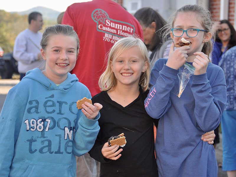East Fannin Elementary School students chowed down on some s’mores during the school’s literacy night Wednesday, October 16. Shown are, from left, Tabor Pass, Claire Saxon, and Karleigh Stiles.