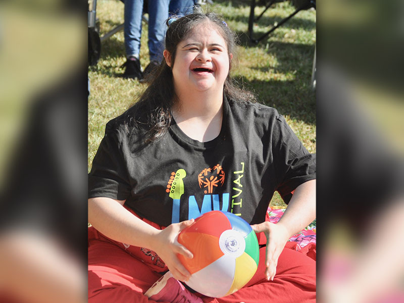 Special Olympics athlete Christina Leon was all smiles as she swayed to the music  during the 2019 Fannin County Special Olympics Music Festival. The event kicked off the Special Olympics year and was located at the downtown Blue Ridge park.