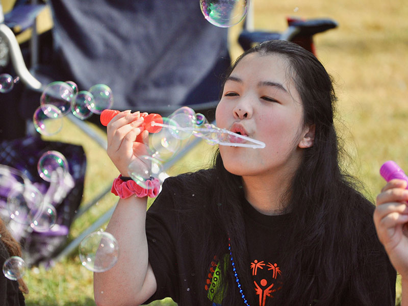Hollie Bruggemeir blew bubbles with her friends at the 2019 Fannin County Special Olympics Music Festival.
