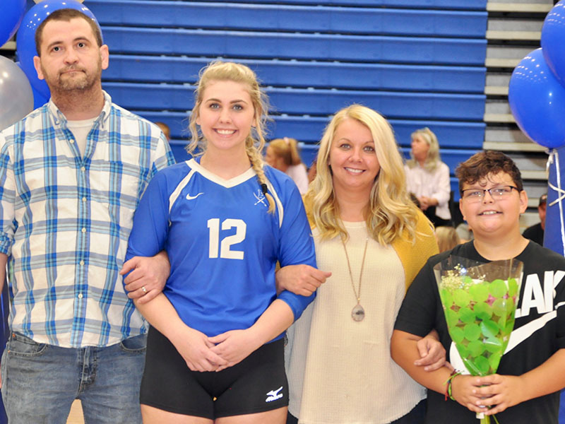 Lady Rebel Hannah Green was escorted by members of her family during Fannin County High School Volleyball team’s Senior Night. Shown are, from left, Tim Green, Green, Crystal Clore and Aydan Hensley.