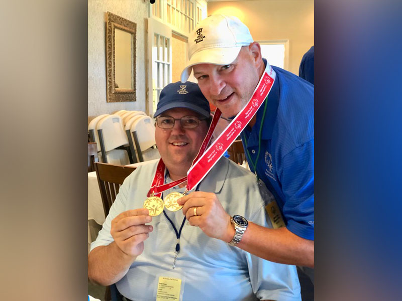 Rick Kruse had a solid day at the State Games, winning back to back gold medals for the second straight year. Kruse, left, and unified partner Jeff Lake show their gold medals. Submitted photo