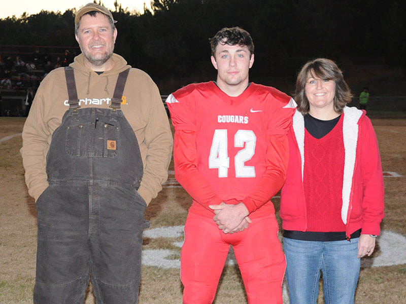 Senior Chance Bailey was honored at Copper Basin’s senior night before the South Pittsburg game Friday, November 1. Bailey is shown with mother Amanda Bailey and Lee Dillard.