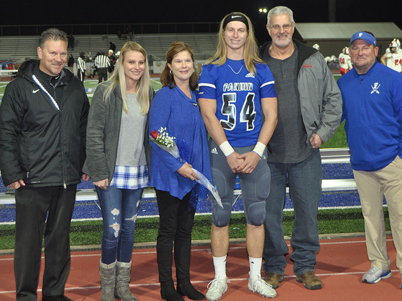 FCHS held senior night for the football players Friday, November 8, before the GAC game. Shown are, from left, Victoria Weeks, sister; Julie Weeks, mother; senior Jackson Weeks and Vernon Weeks, father.