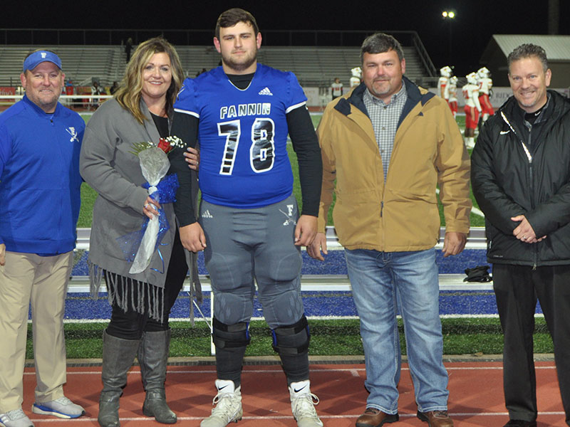 Fannin County High School senior Miles Johnson was one of the football seniors honored before the Rebels game against GAC Friday, November 8. Johnson is shown with his parents, Leslie Mann and Earl Johnson.