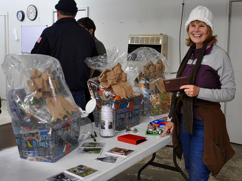 Fannin County Animal Control hosted an open house event for members of the community to come walk dogs and check out the recent improvements to the establishment Friday, November 9. Shown is volunteer Martha Jewett entering to win raffle prizes.