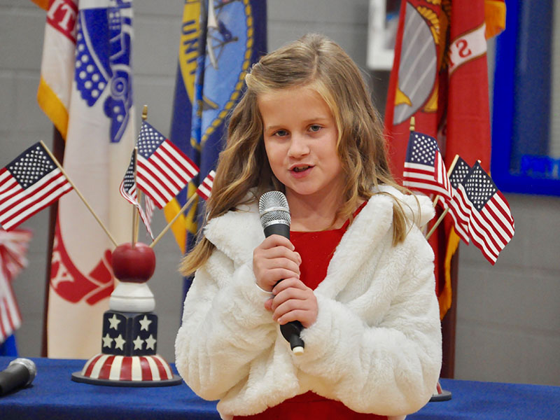 Blue Ridge Elementary School student Lily Whitener sang “You Are Our Heroes” at the school’s Veterans Day Ceremony Friday, November 8.