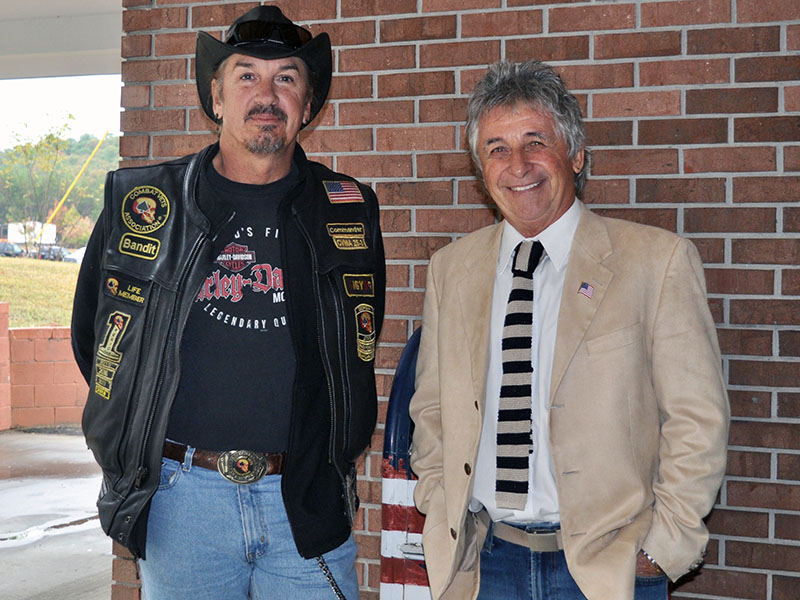 Combat Veterans Motorcycle Association North Georgia chapter members Rob Denison, left, and Bob Renneke were instrumental in getting veteran organization motorcycle riders to escort the Vietnam Traveling Memorial Wall when it arrived in Blue Ridge Thursday, October 3.